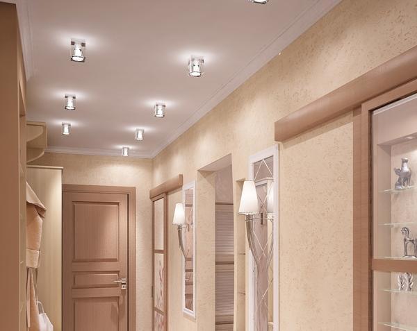 Для длинных коридоров лучше использовать светлые тона нятяжных потолков и освещение делать равномерно по всей площади потолка